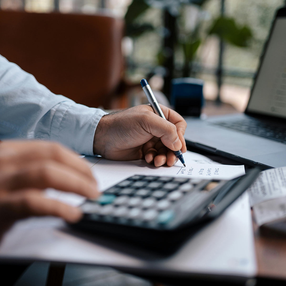 Man calculating his taxes
